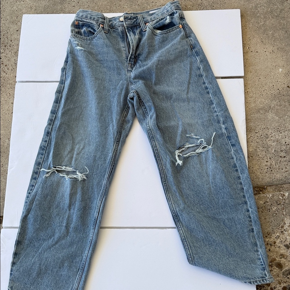 Distressed Blue Jeans